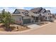Charming two-story home with a two-car garage, driveway, and manicured front yard on a quiet street at 7010 Homeplace Pt, Castle Rock, CO 80108