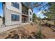 Two-story home featuring a patio on the first level and a balcony on the second, in a beautifully landscaped yard at 7010 Homeplace Pt, Castle Rock, CO 80108