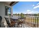 Outdoor patio with seating and neighborhood views on a sunny day at 7010 Homeplace Pt, Castle Rock, CO 80108