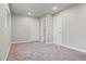 Simple and spacious bedroom with neutral colored carpet and walls at 181 E 108Th Ave, Northglenn, CO 80233