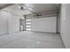 Spacious garage with overhead door and ample storage space at 181 E 108Th Ave, Northglenn, CO 80233