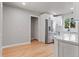 Eat-in kitchen with stainless steel appliances and white cabinets at 181 E 108Th Ave, Northglenn, CO 80233