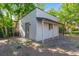 Detached storage shed with a covered porch, ideal for extra storage at 181 E 108Th Ave, Northglenn, CO 80233