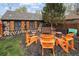 Beautiful backyard featuring a custom painted shed with wooden shutters and Adirondack chairs at 1891 S Madison St, Denver, CO 80210
