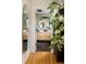 Ensuite bathroom featuring dual vessel sinks, wood accents, and slate tile flooring at 1891 S Madison St, Denver, CO 80210