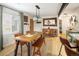 Chic dining area showcasing modern furniture, artistic decor, and an open concept design at 1891 S Madison St, Denver, CO 80210
