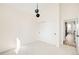 Bright bedroom with modern lighting, closet, and views to other rooms at 9185 W Eaton St, Westminster, CO 80031