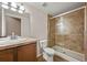 Bathroom featuring a single sink vanity, large mirror, and glass shower enclosure at 11704 Hale Ct, Parker, CO 80138