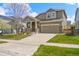 Inviting two-story home with a well-kept lawn, charming covered porch, and a two-car garage at 11704 Hale Ct, Parker, CO 80138