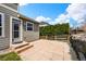 Exterior view showcasing the home's private patio, steps to door, and landscaping at 11704 Hale Ct, Parker, CO 80138