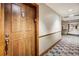 Hallway with unit number and exit signs with carpeted floors at 34 Highfield Trl # 112, Breckenridge, CO 80424