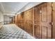 Hallway with multiple doors with unit numbers and carpeted floors at 34 Highfield Trl # 112, Breckenridge, CO 80424