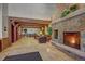 Inviting lobby features a stone fireplace, beamed ceilings, and comfortable seating at 34 Highfield Trl # 112, Breckenridge, CO 80424