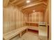 Inviting wooden sauna features a heater with rocks and built in benches for relaxing at 34 Highfield Trl # 112, Breckenridge, CO 80424