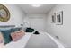 Cozy bedroom with a comfortable bed, closet, and modern decor at 4003 Federal Blvd, Denver, CO 80211