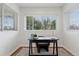 Bright office featuring a desk, chair, and natural light coming through large windows at 4003 Federal Blvd, Denver, CO 80211