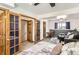 Open living space featuring a bedroom, living area, and closet at 1141 Beech St, Fort Lupton, CO 80621