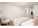Cozy bedroom with a comfortable bed, soft colors, and natural light at 1243 N Washington St # 108, Denver, CO 80203