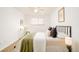 Relaxing bedroom with a comfortable queen-sized bed, modern decorations and a window with coverings at 1243 N Washington St # 108, Denver, CO 80203