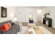 Cozy living room featuring modern decor, soft lighting, and a comfortable seating arrangement at 1243 N Washington St # 108, Denver, CO 80203