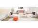 Spacious living room with modern decor, cozy seating, and abundant natural light at 1243 N Washington St # 108, Denver, CO 80203