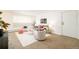 Well-lit living room with stylish furniture, contemporary decor, and a comfortable layout at 1243 N Washington St # 108, Denver, CO 80203
