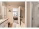 Modern bathroom with a shower and tub combination, and granite countertop at 1063 Gianna Ave, Fort Lupton, CO 80621