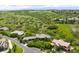 Aerial view of a luxury home and lush greenery at 12775 Horizon Trl, Castle Pines, CO 80108