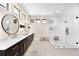 A spacious bathroom boasting a double vanity, a large glass shower, and modern fixtures at 12775 Horizon Trl, Castle Pines, CO 80108