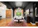 Dining room with a dark ceiling, chandelier, and hardwood floors at 12775 Horizon Trl, Castle Pines, CO 80108