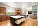 Modern kitchen featuring a large island, stainless steel appliances, and plenty of counter space at 12775 Horizon Trl, Castle Pines, CO 80108