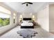 Spacious main bedroom with a vaulted ceiling and large windows at 12775 Horizon Trl, Castle Pines, CO 80108