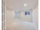 Open basement area with windows and closet space at 15224 W 73Rd Ave, Arvada, CO 80007
