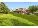 Charming two-story home with landscaped yard and inviting covered front porch at 15224 W 73Rd Ave, Arvada, CO 80007