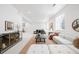 Spacious living room featuring sleek decor, modern furnishings, and natural light at 1241 S Garfield St, Denver, CO 80210