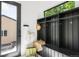 Welcoming mudroom with storage cubbies, coat hooks, bench seating and bright natural light at 1241 S Garfield St, Denver, CO 80210