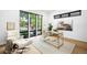 Bright home office features large windows, a modern desk, and a sleek chair, creating a productive workspace at 1241 S Garfield St, Denver, CO 80210