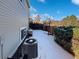 Small backyard with a snow-covered ground and a wooden fence at 6442 Yank Ct # C, Arvada, CO 80004