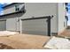 Attached single-car garage with concrete driveway at 1525 E 3Rd Ave, Longmont, CO 80501