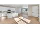 Bright and airy kitchen area with white cabinets, granite countertops, and natural light at 1525 E 3Rd Ave, Longmont, CO 80501