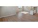 Bright and airy living space featuring wood floors, neutral walls, and natural light at 1525 E 3Rd Ave, Longmont, CO 80501