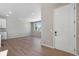 Bright living area with wood flooring, recessed lights, and large windows offering great natural light at 1525 E 3Rd Ave, Longmont, CO 80501