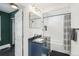 Bathroom features modern fixtures, a shower, a vanity with storage, and a sleek, modern aesthetic at 4196 S Pennsylvania St, Englewood, CO 80113