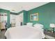 Spacious bedroom with modern furnishings, closet and en suite bathroom at 4196 S Pennsylvania St, Englewood, CO 80113