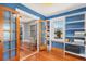 Bright office with custom built-ins, hardwood floors, and french doors at 4196 S Pennsylvania St, Englewood, CO 80113