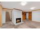 Basement living room featuring a brick fireplace at 1049 Galena St, Aurora, CO 80010