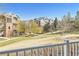 Expansive view from the balcony showcasing the well-maintained lawns and landscaping at 2705 S Danube Way # 101, Aurora, CO 80013