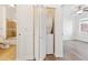 Bathroom and in-unit laundry closet at 2705 S Danube Way # 101, Aurora, CO 80013