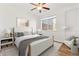 Comfortable bedroom with large window and neutral decor at 2705 S Danube Way # 101, Aurora, CO 80013