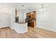Well-lit kitchen and dining area featuring granite countertops and stainless steel appliances at 2705 S Danube Way # 101, Aurora, CO 80013